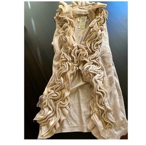 Ruffled front sleeveless sweater